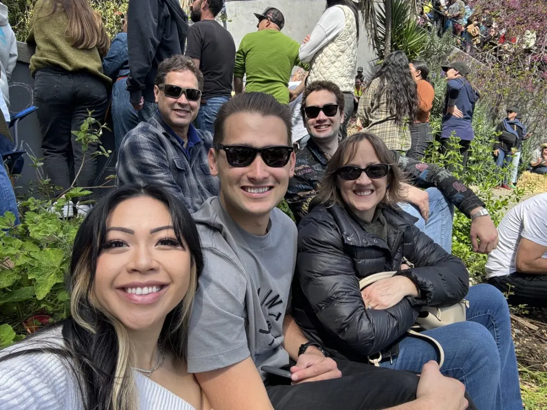Ysabelle and Jordan with his parents at a street party in San Francisco